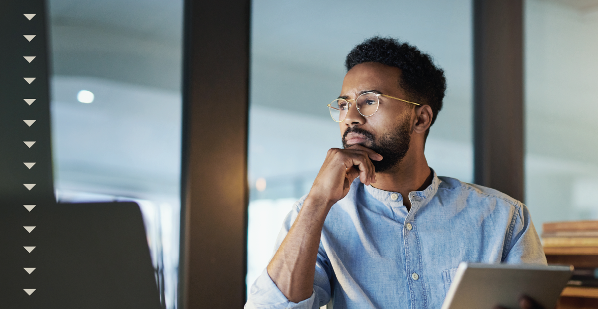 man-wearing-glasses-office-setting